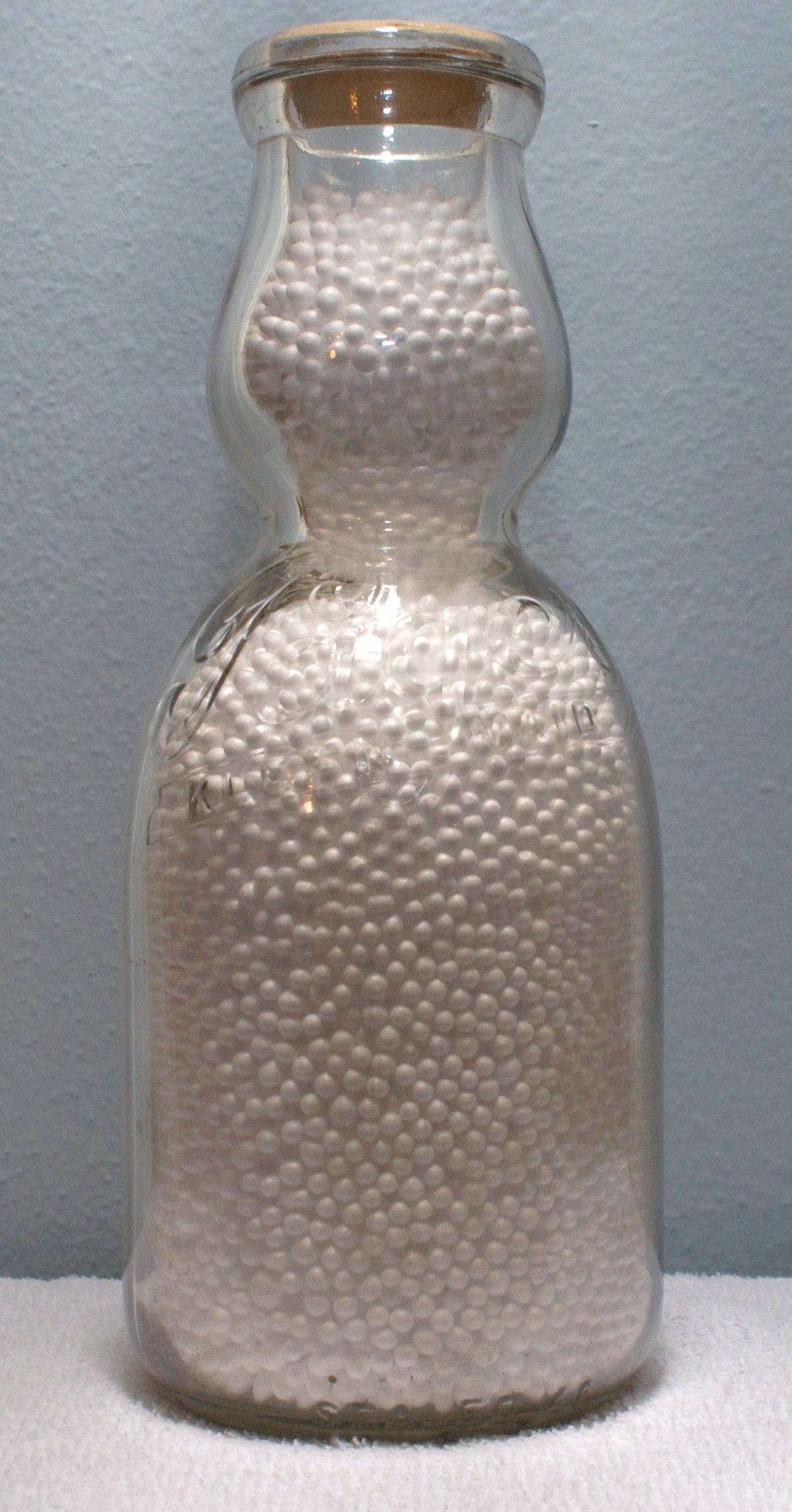 Embossed Pages Cream Top Quart Milk Bottle Early 1940s